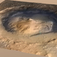 Gale Crater, the landing spot of NASA’s Curiosity Mars rover, has a three-mile-high mound at its center called Mount Sharp. Image: NASA/JPL.